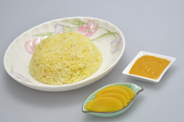 Examples of food items that may be prepared with turmeric: yellow steamed rice (left), mustard condiment (top right) and pickled daikon radish (bottom right)