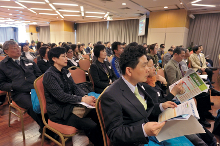 Participants listen attentively to the speaker