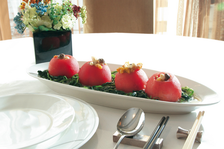 Poached Whole Tomato Stuffed with Mixed Mushrooms