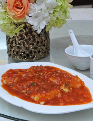 Fried Fish with Sweet and Sour Sauce, succulent fish fillets with a crispy coating